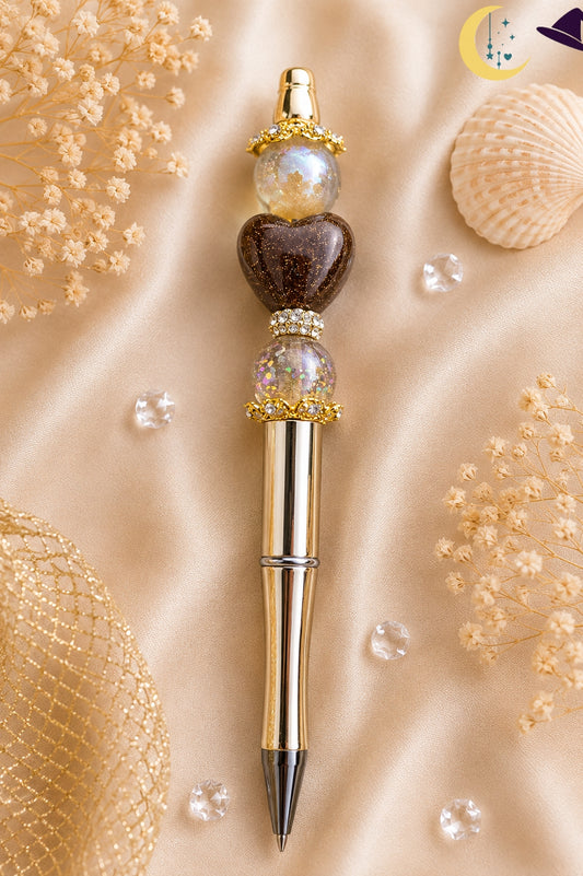 Stylo bijou doré – élégance chaleureuse et raffinement scintillant